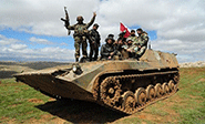 Camino a la estrat&eacute;gica ciudad de Yisr al Shugur