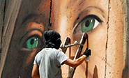 Dos artistas italianos y un palestino van a prisi&oacute;n por pintar el retrato de Tamimi